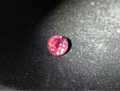 GS-000001 — 0.65 ct owner-described Padparadscha Sapphire, face-up view